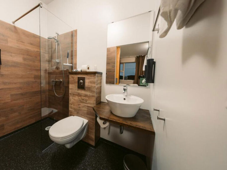 Interior of the bathroom in the guest rooms at the Vos Hotel